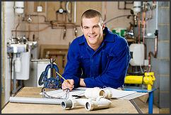 A Santa Clara Plumber works on a new pipe schematic